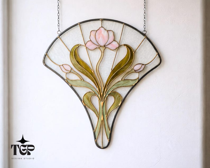 Fan-shaped floral stained glass panel in pink and green